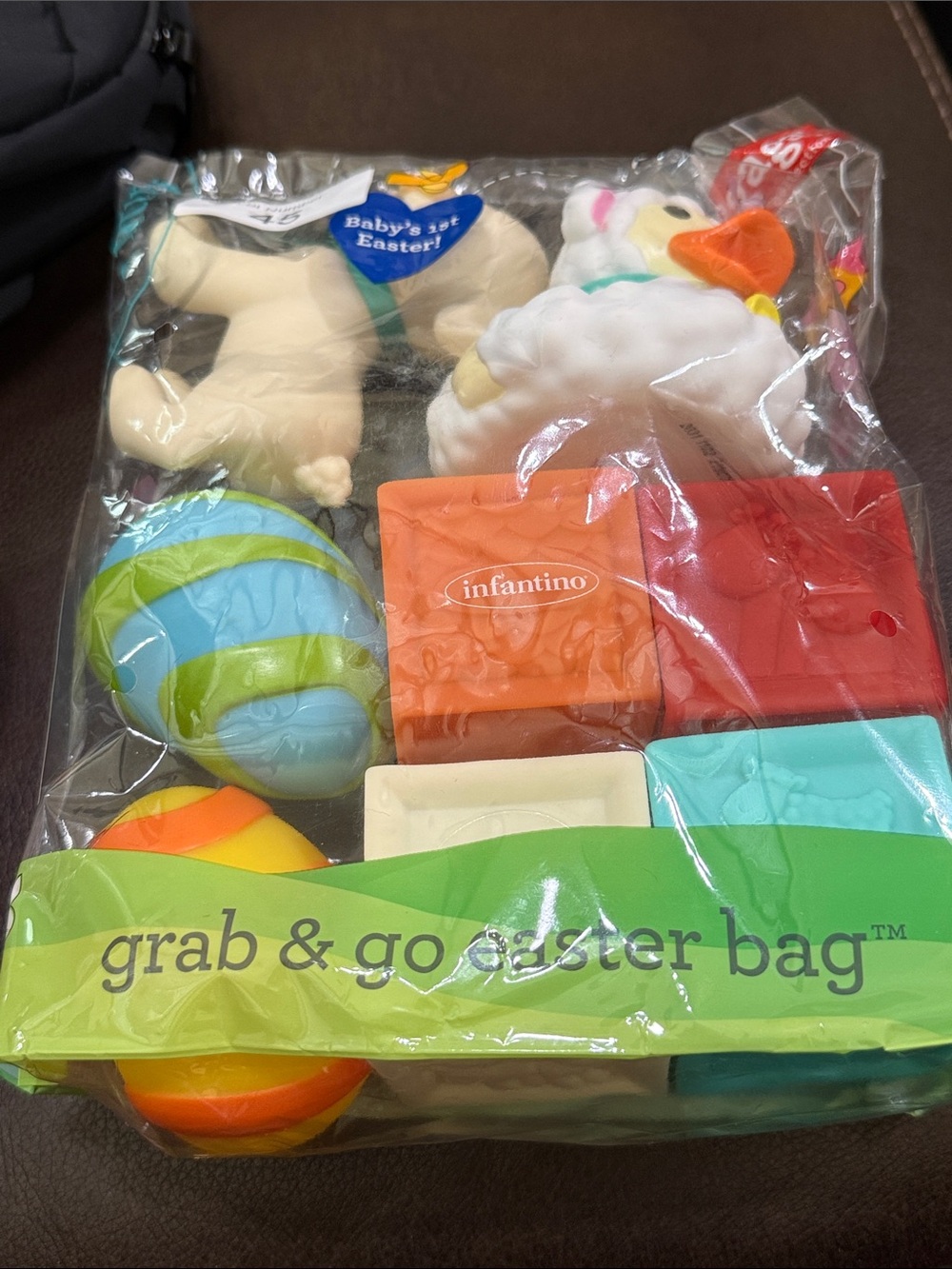Infantino Multi-Color Grab & Go Toy Bag - Orange Blue Green Red Cream